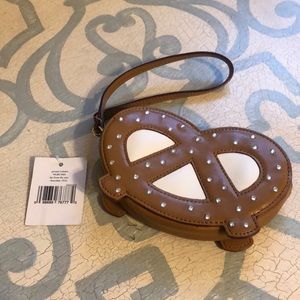 Kate Spade Rhinestone Embellished Leather Pretzel Wristlet far from the tree